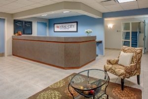 front desk of federal city inn and suites