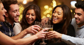 group of people toasting their champagne