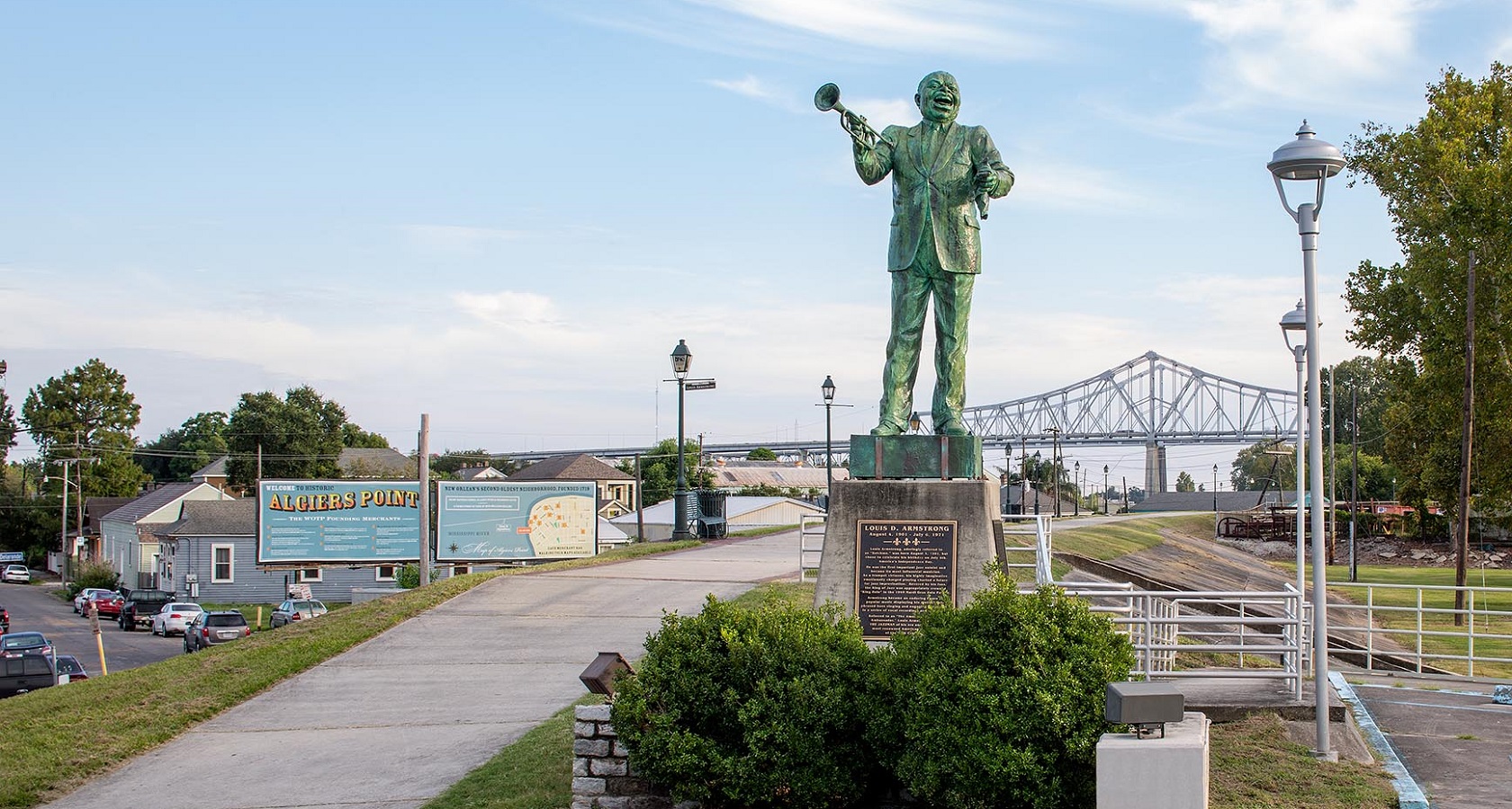 old jazz statue of man playing trumpet on algiers point